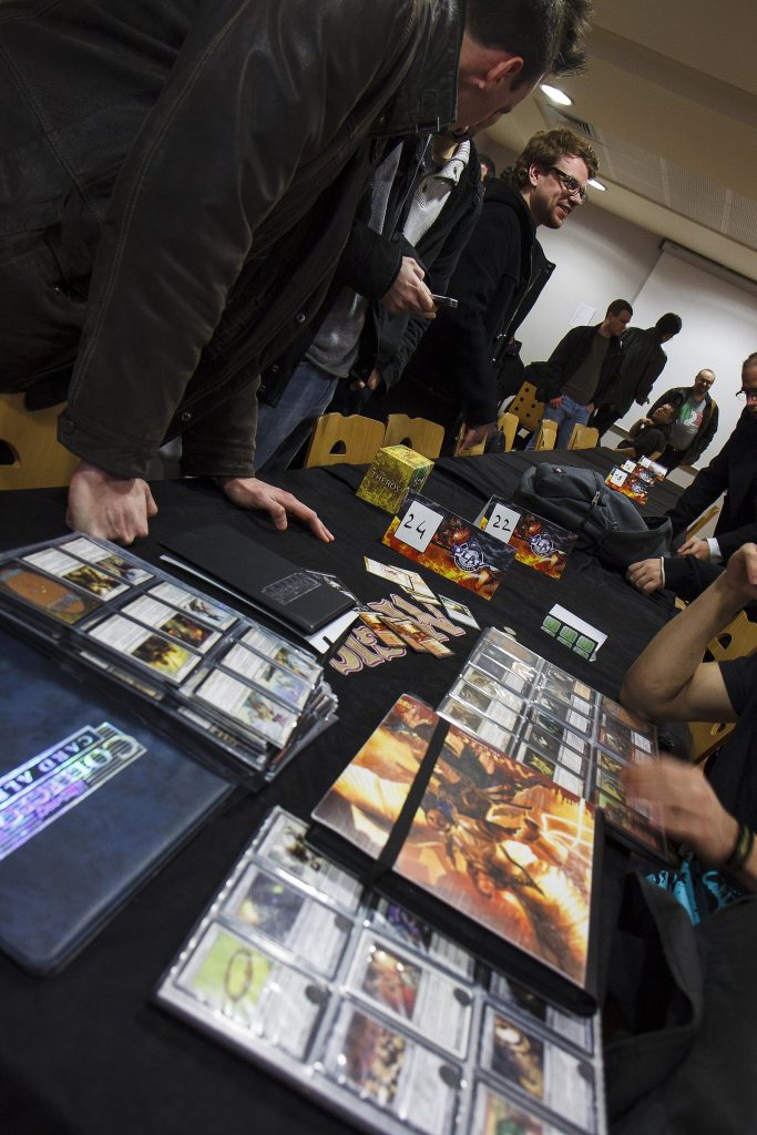 Binders full of Magic: The Gathering cards for trading